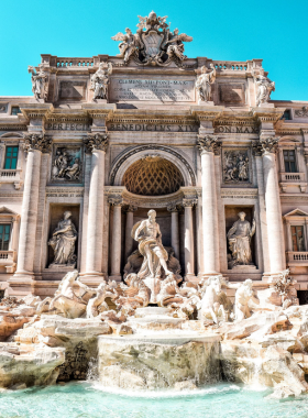 Admire the Trevi Fountain This image shows the stunning Trevi Fountain in Rome, a Baroque masterpiece with sculptures and cascading waters.