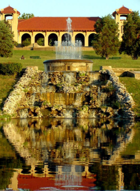 2. Forest Park Green Oasis Image "This image shows Forest Park’s peaceful lake surrounded by lush trees, open pathways, and recreational areas. The park’s expansive green spaces create a relaxing urban escape where visitors can enjoy nature, trails, and cultural attractions."