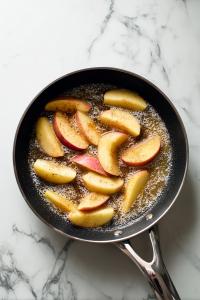 Saute apples with butter, spices, sugar, and flour.