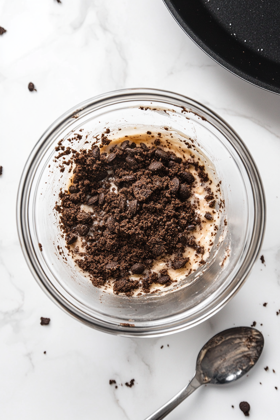Mixing the Crust Ingredients for Oreo Crust Cheesecake