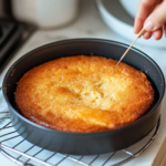 baked orange cranberry coffee cake cooling on rack is ready