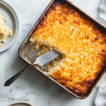 slicing and serving crisp golden risotto cake with mushroom topping