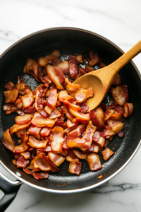 Chicken broth being poured into the pot, deglazing the bottom and mixing with sautéed vegetables.
