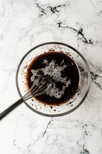 In a bowl, whisk together all the sauce ingredients