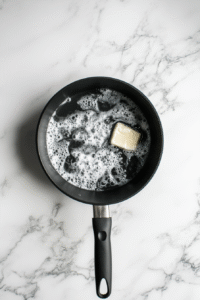 Add hot pepper sauce, white vinegar, Worcestershire sauce, cayenne pepper, garlic powder, and salt.