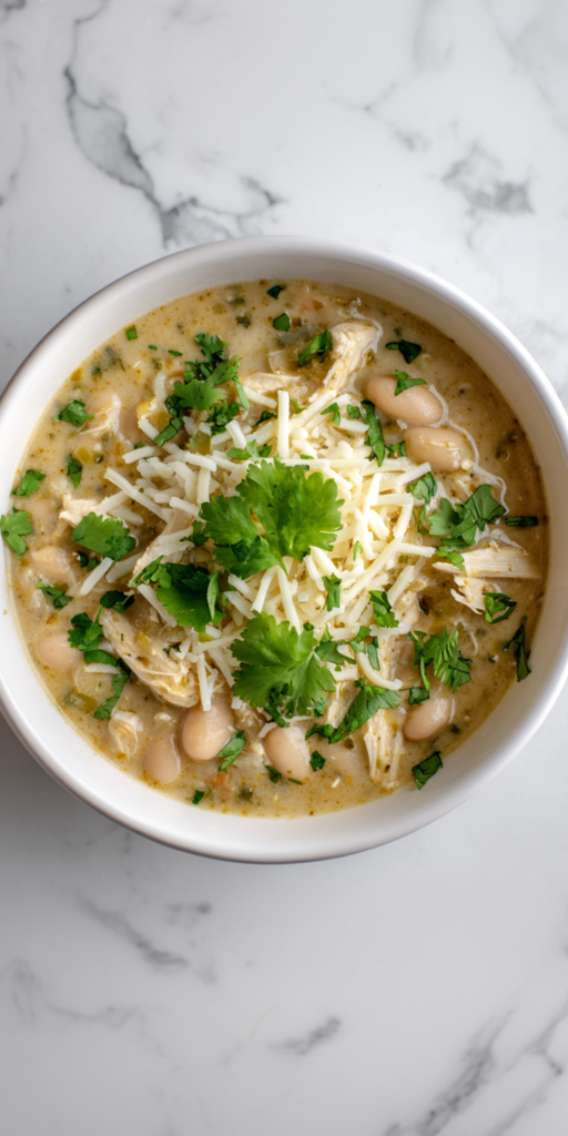 Serve hot topped with shredded cheese and extra cilantro if desired.