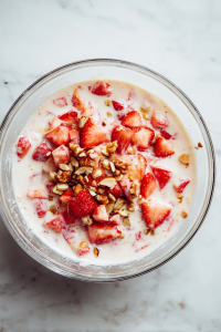 Add diced strawberries and chopped nuts; mix lightly without over-stirring.
