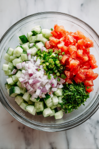 Add them to a mixing bowl along with chopped green chili.