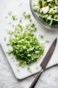 Chop the green onions and add everything to a mixing bowl.