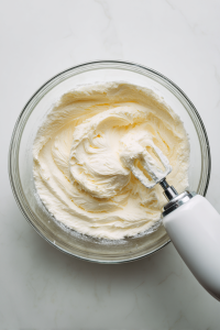 Cream softened butter and sugar in a large bowl until light and fluffy.