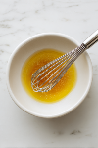 In a small bowl, whisk together avocado oil, rice vinegar, sesame oil, tamari, ginger, and garlic to make the dressing.