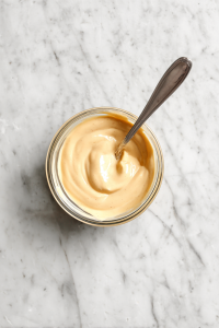 In a small bowl, mix mayonnaise and Dijon mustard. Set aside.