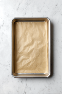 Preheat oven to 300°F (150°C) and line a baking tray with parchment paper.