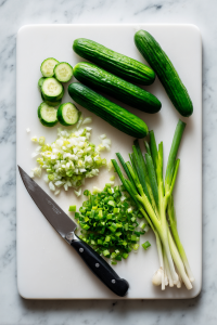Slice cucumbers and green onions thinly.