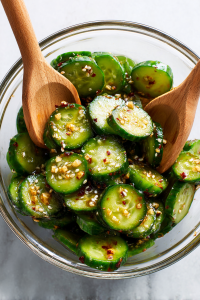 Toss cucumbers with the prepared dressing until evenly coated.