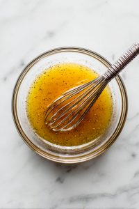 Whisk the dressing until well combined.